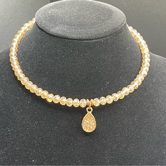 Modern light amber colored crystal choker with a teardrop rhinestone pendant. - Picture 8 of 9